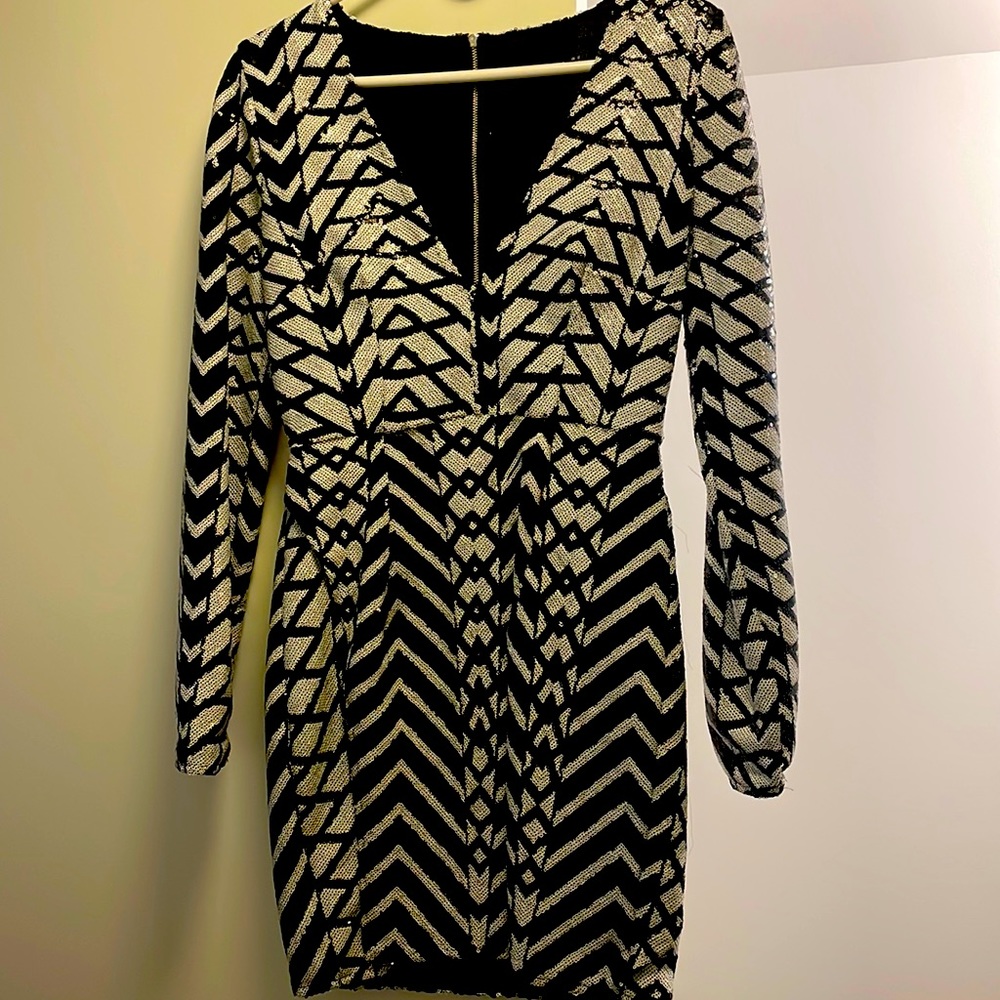 Perfect dress for New Years Eve/ Holiday Event or any special occasion.